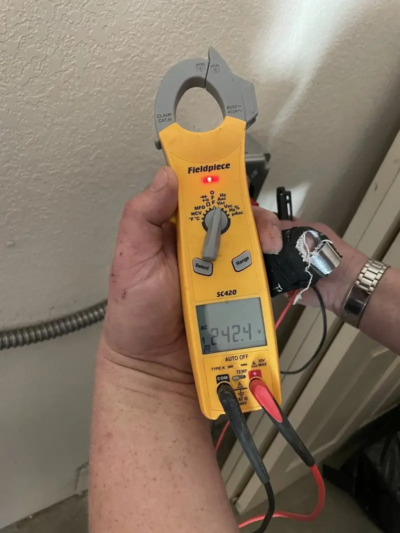 Voltage testing with clamp meter during Generator Installation in East Huntingdon